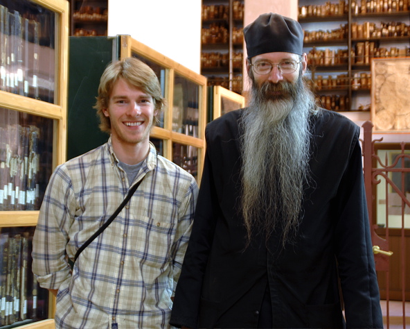 Brady and Father Justin in St. Catherine's library